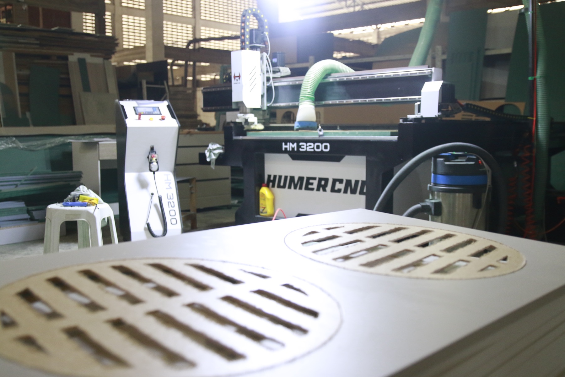 CNC-cut circular ventilation parts fresh off the machine