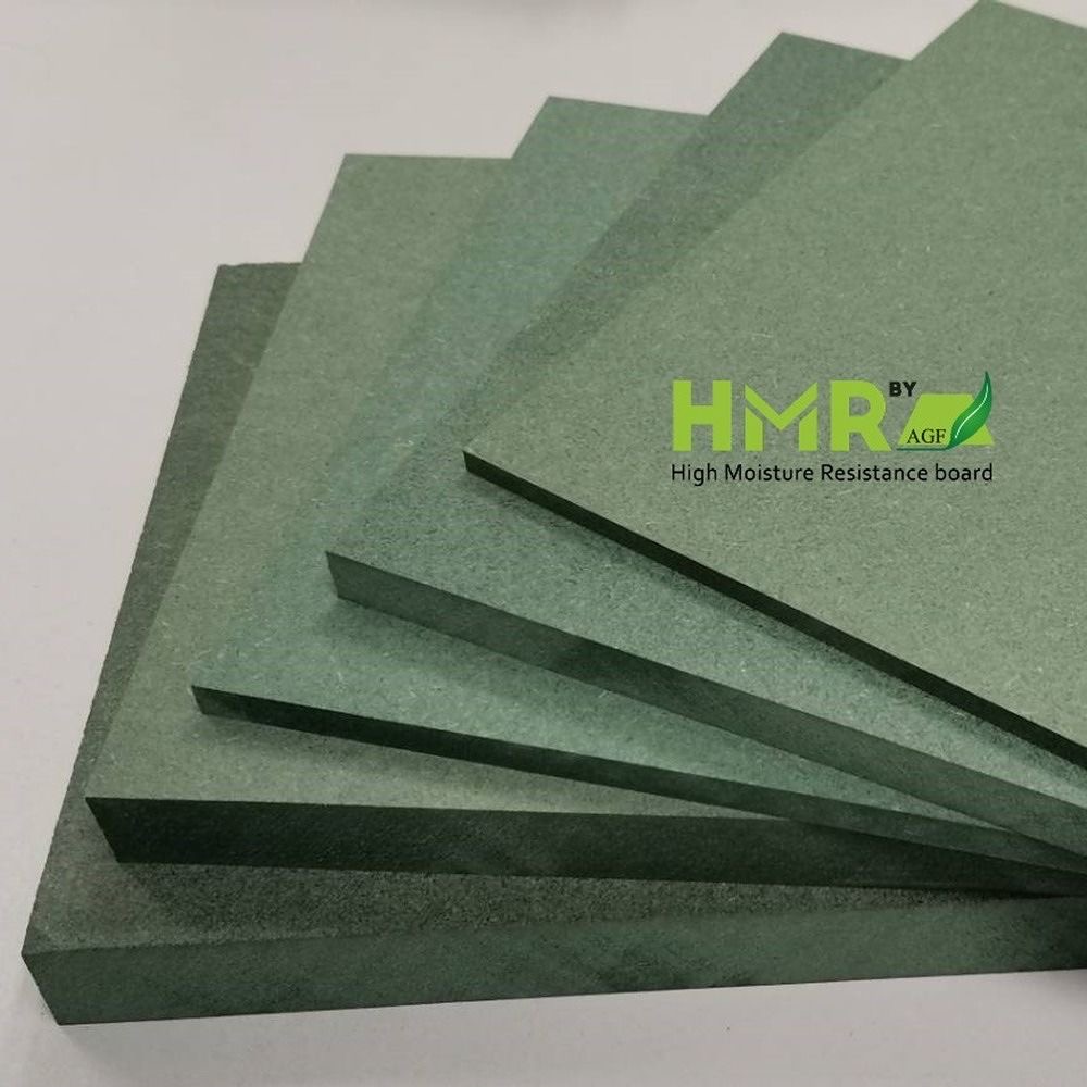 Stacked sheets of genuine HMR board by AGF, the moisture-resistant board used in every HAÜS piece